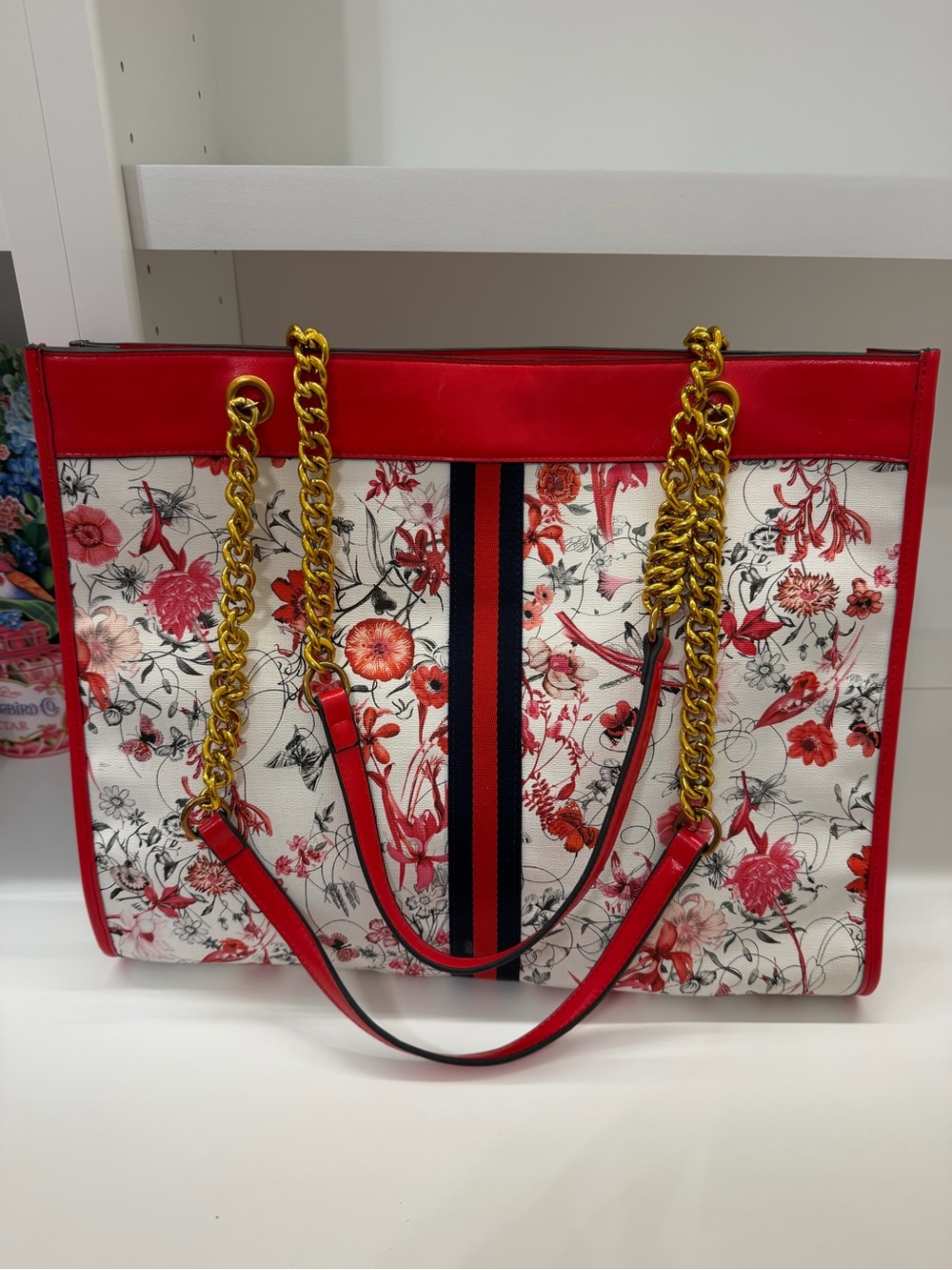 Boutique Red Floral Tote Bag with Gold Chain Straps.